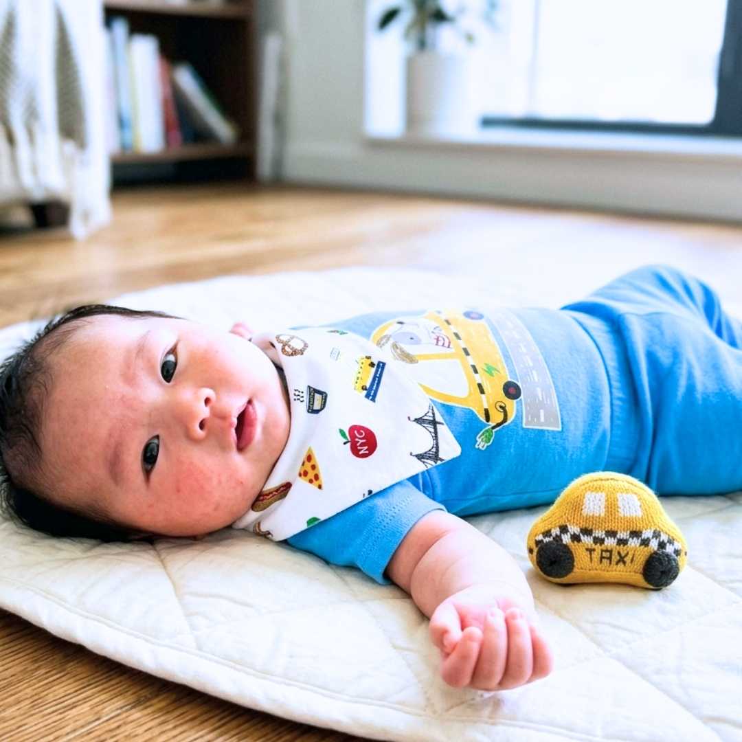 Baby bib with NYC print on infant