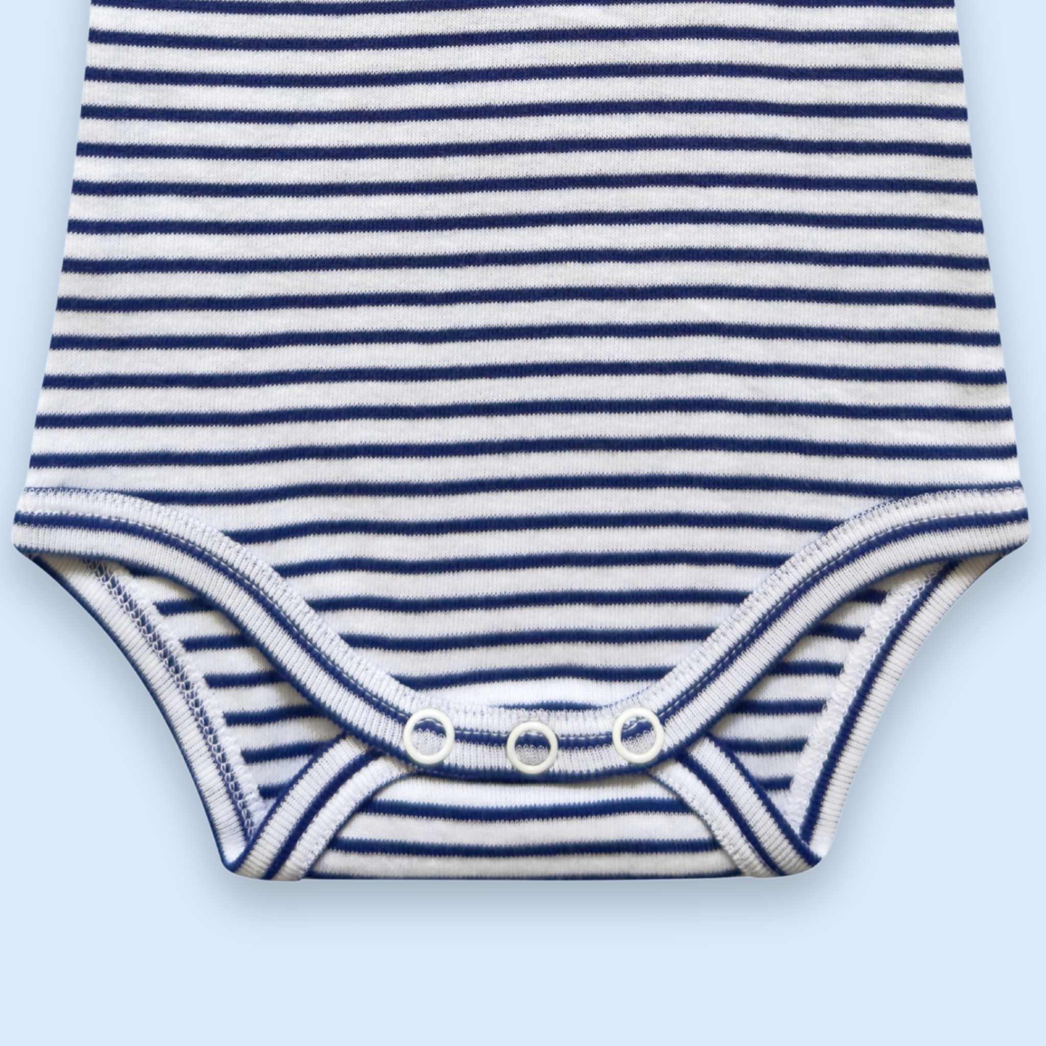 Estella Baby Clothes Organic MVP Football Embroidered Bodysuit. Detail showing the crotch with snap closure