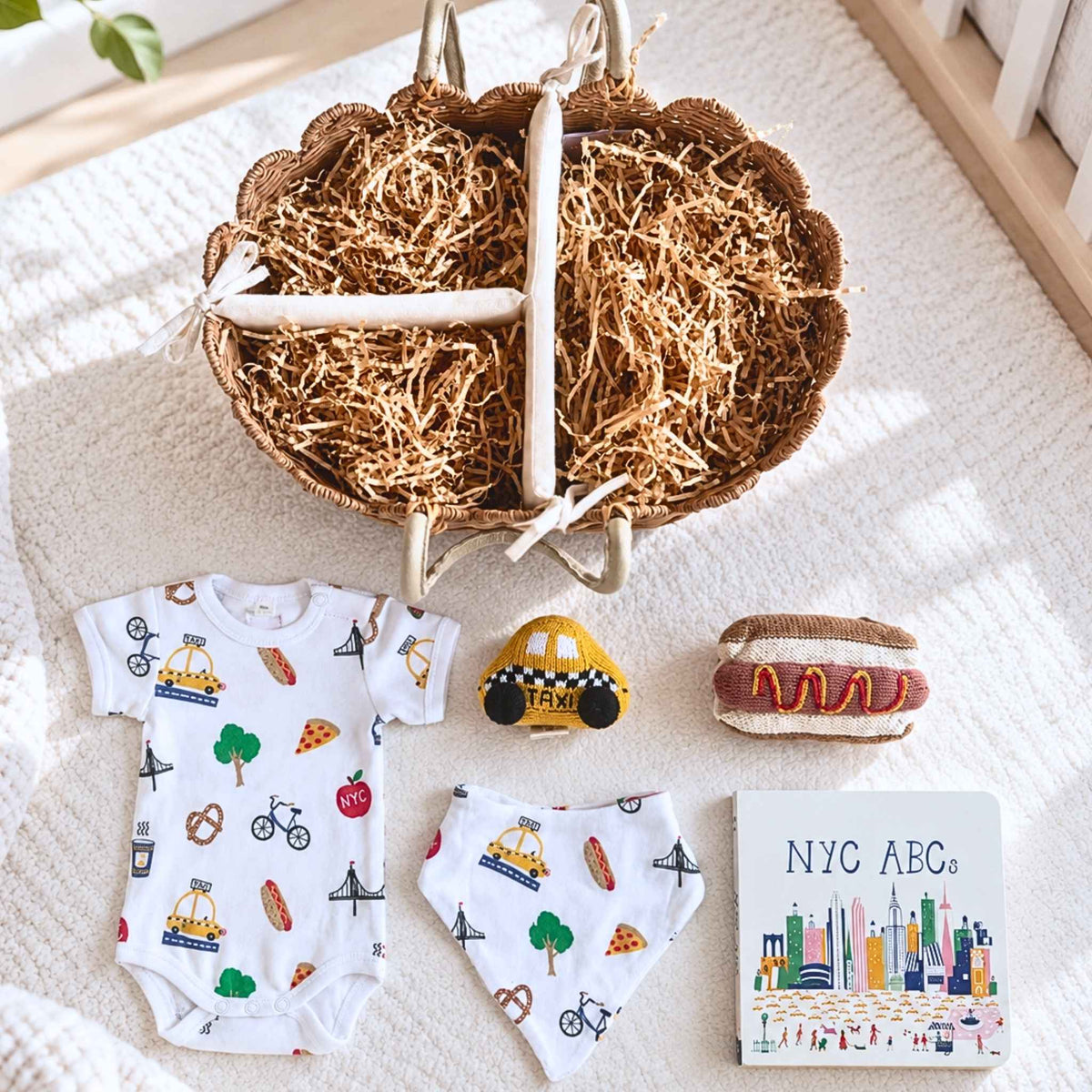 Estella Baby Gift Sets Welcome NYC Baby Gift Basket: 6 Pieces in a Rattan Caddy