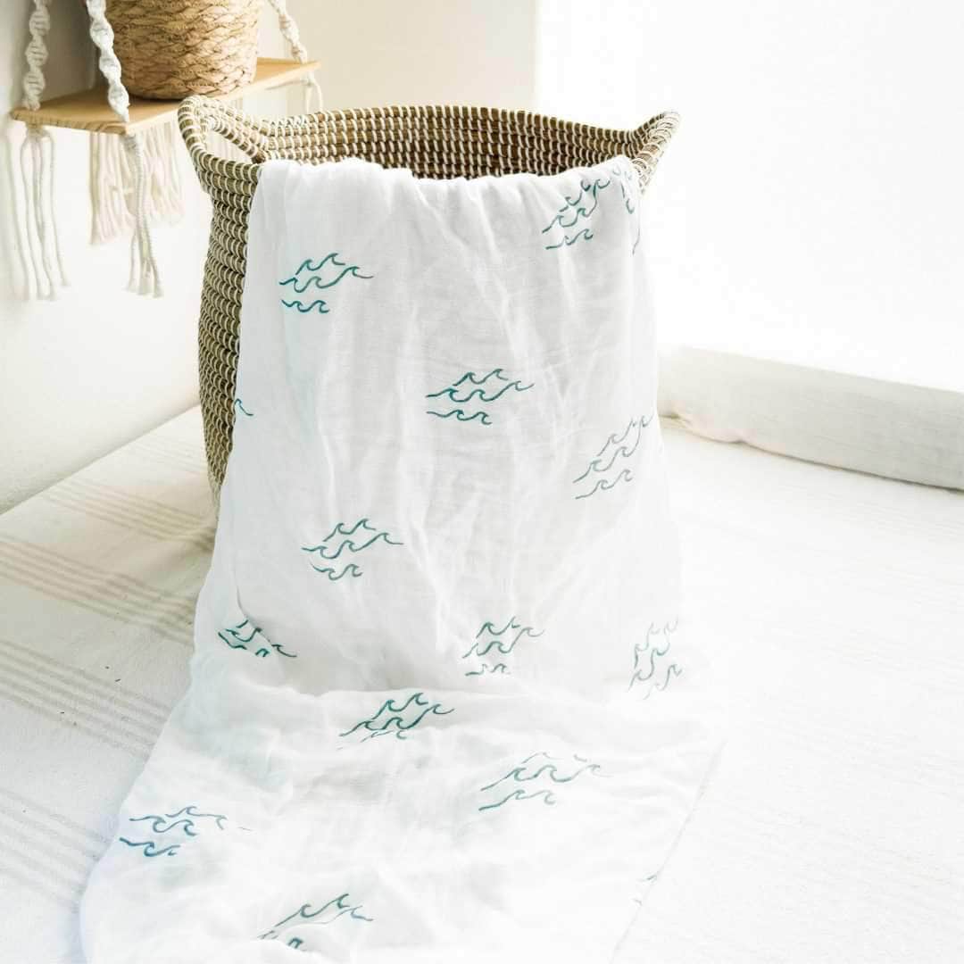 Organic Cotton Baby Swaddle Blanket – Ocean Wave Print | Estella x Coca + B.