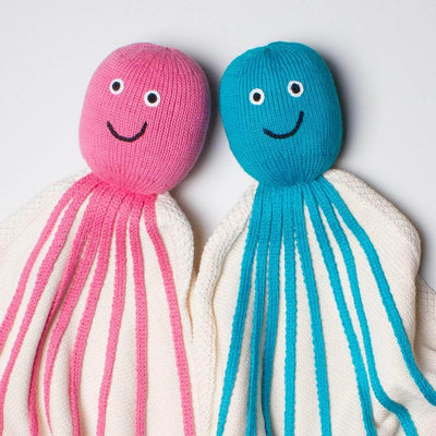 organic octopus blanket with pink color and turquoise color. 