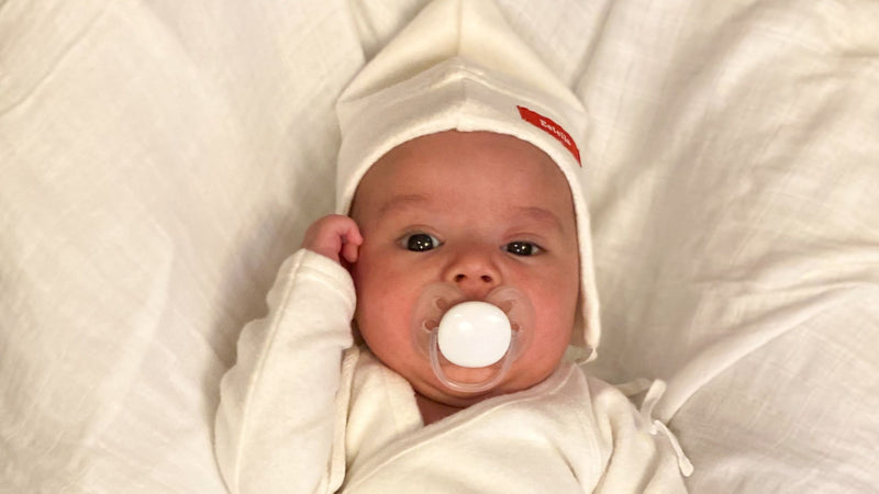 baby with organic cotton sherpa hat