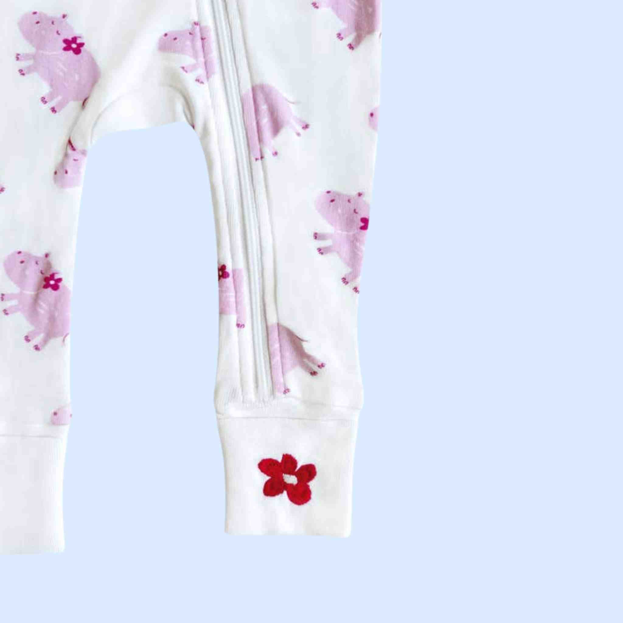 Estella Baby Clothes Organic Zip Rompers with Pink Hippo and Floral Print and Embroidery. Detail showing the zipper closure and Floral Embroidery