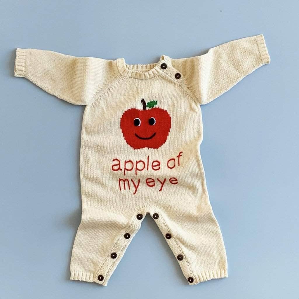 organic long sleeve romper apple of my eye. Red, green, cream and black and white eyes.