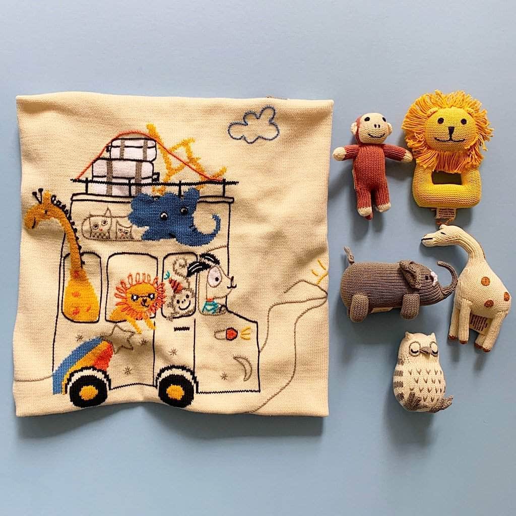 Baby gift set animal road trip blanket, monkey, lion, elephant, giraffe, and owl rattle toys. 