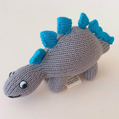organic baby rattle stegosaurus toy. Grey, blue and black and white eyes. 