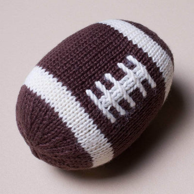 organic baby rattle football toy. Brown and white stitches. 
