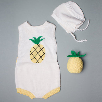 organic baby gift set. sleeveless pineapple romper, bonnet hat, and a pineapple baby rattle. 