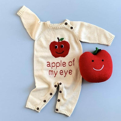 organic long sleeve apple romper with apple stuff toy.