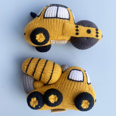 organic construction baby rattle toy mixer and organic baby rattle roller construction toy. Yellow, black, and white.
