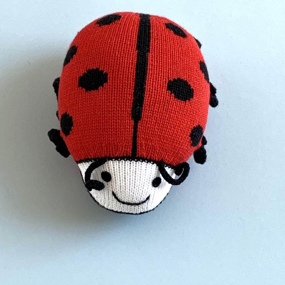 organic stuff animal toy ladybug. Red, cream and black.