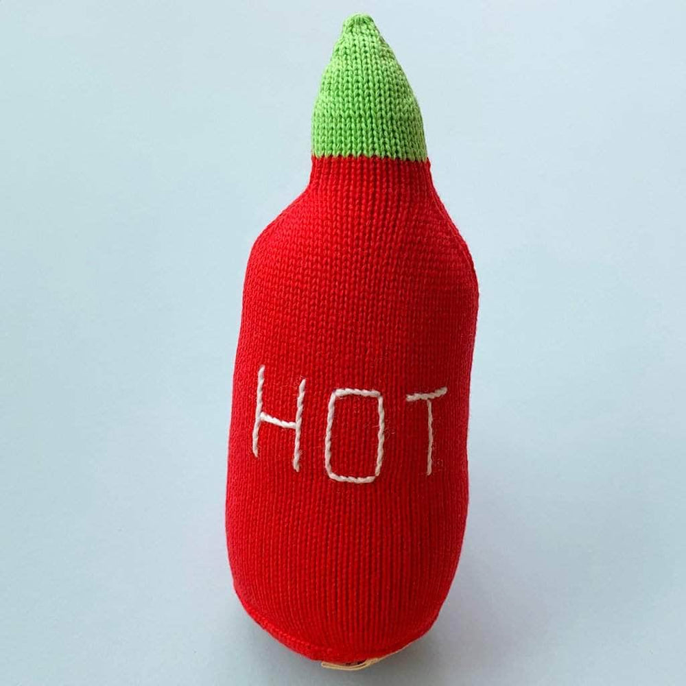 organic stuff toy knit hot sauce. Green and red with white letter.