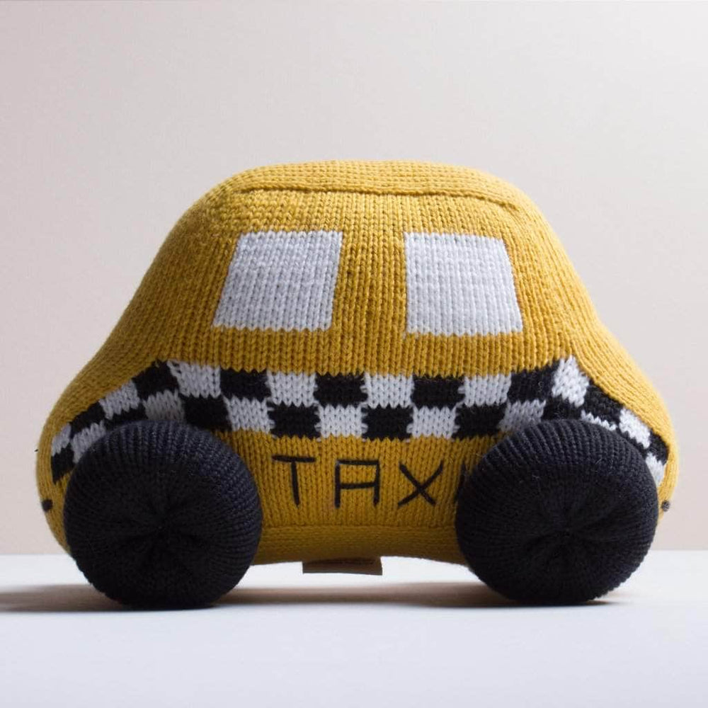 knit organic stuff toy taxi medium size. Yellow, black, and white.