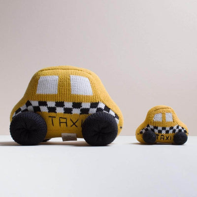 organic stuff toy taxi with baby rattle taxi toy. Yellow, black and white.