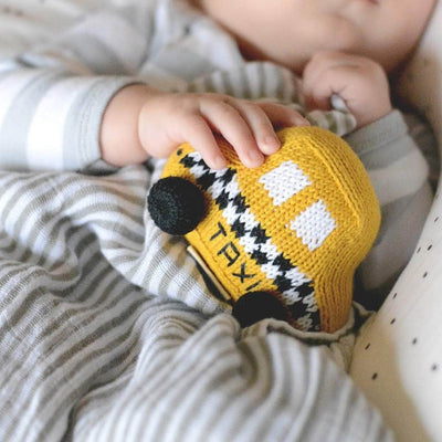 organic baby rattle toy taxi. Yellow, black and white.