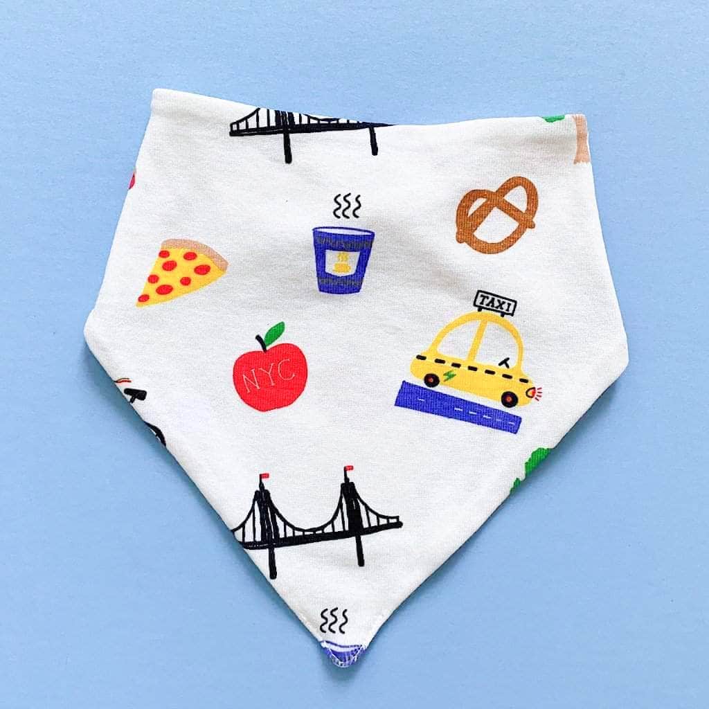 organic bibs with taxi, apple, hot dog, pretzel and bicycle pattern. 
