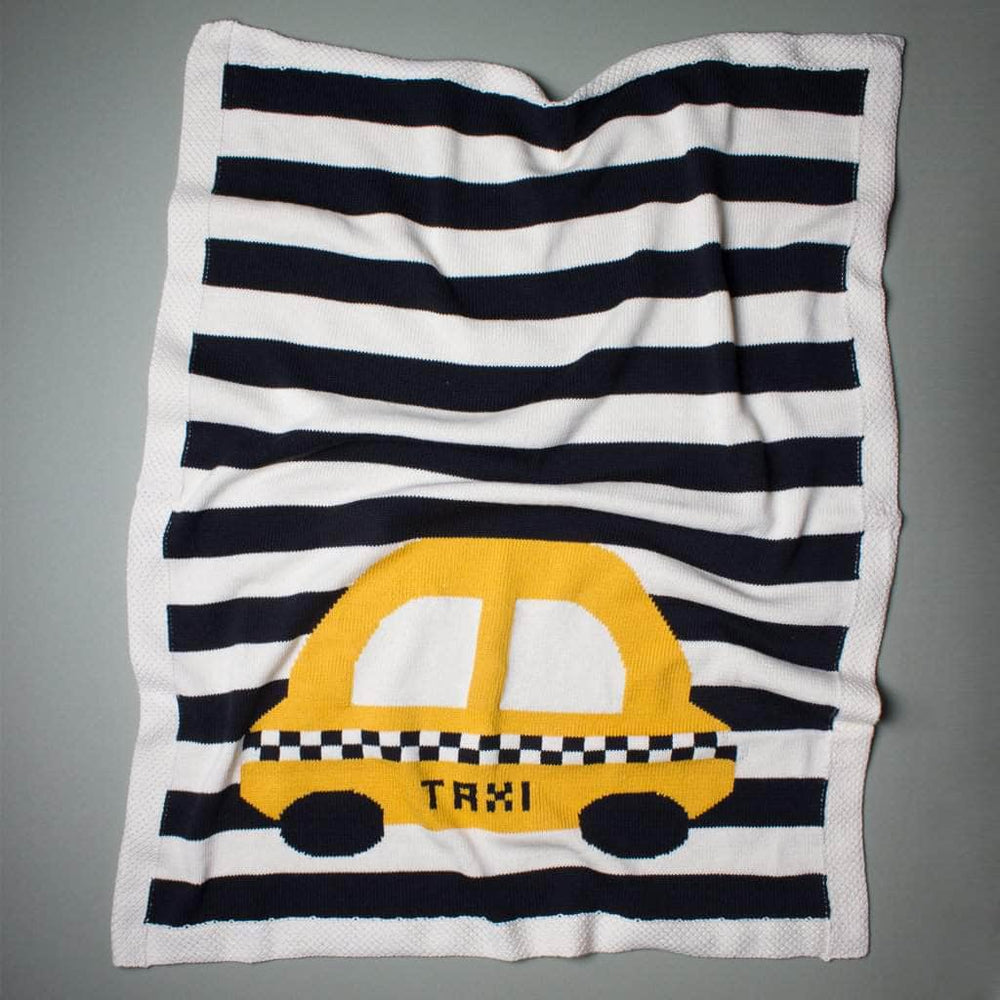 organic blanket large taxi. Black stripes and yellow taxi with black and white checker image in front.