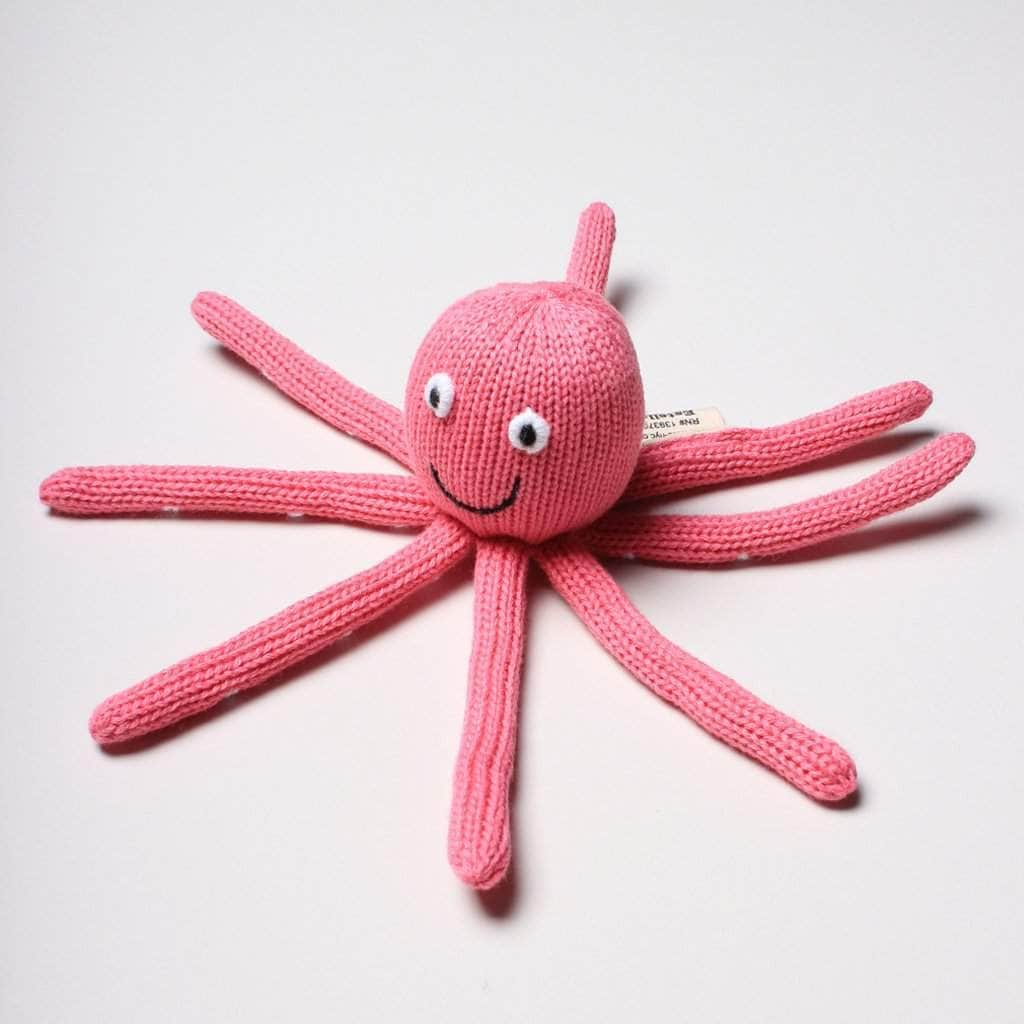 organic octopus rattle pink with white eyes. 