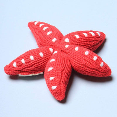 organic rattle toy starfish. Red and white.